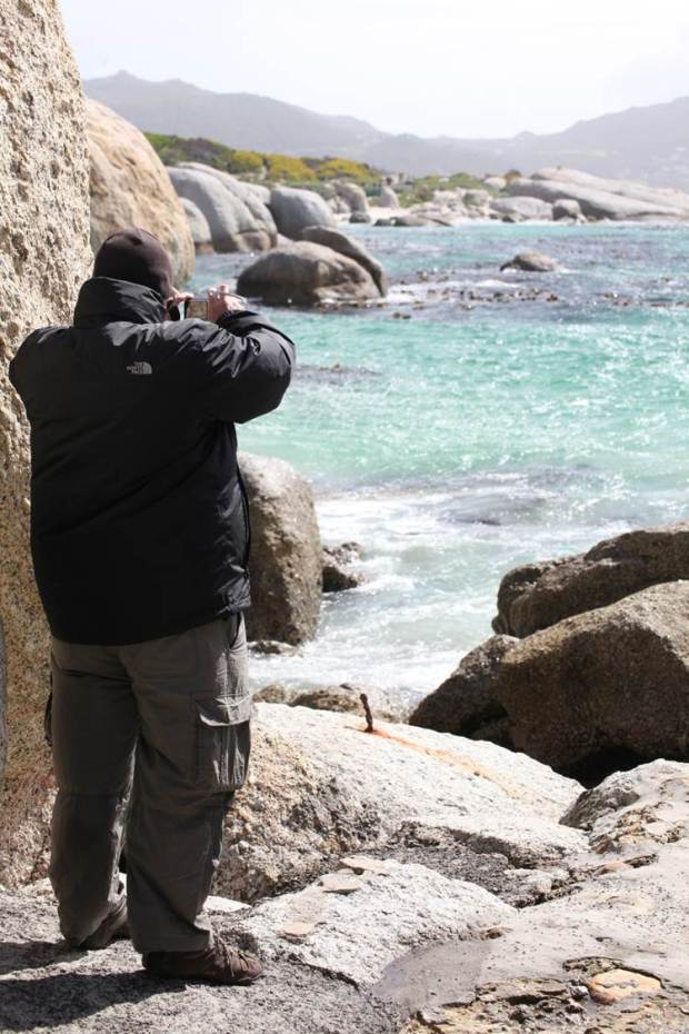 My husband scans Boulders Bay in S.Africa for penguins.