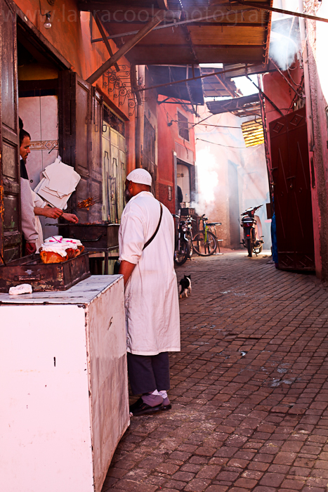 Many locals stop to chat at the various stalls and food shops around the souks.