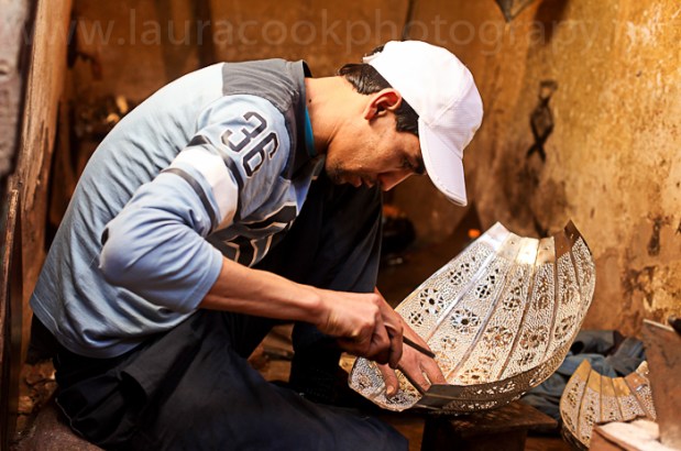 In the middle of the souks of Marrakech are a a few small streets where the metal workers toil. This young man is one of the many individuals creating the lanterns that line the shelves of the tourist stalls.