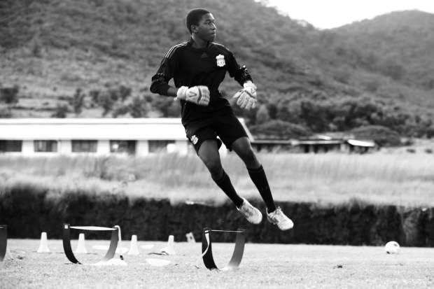 My photo diary for 2013 would not be complete without showing you a few images from the Craig Bellamy Foundation Academy in Sierra Leone. This is my new home and place of work. Here one of our talented goalkeepers trains on the pitch.