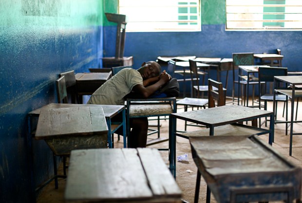 A long day! Many students in Sierra Leone have to wake up early to get to school and many also help their parents with chores and money-making enterprises so school can be a tiring place to be.