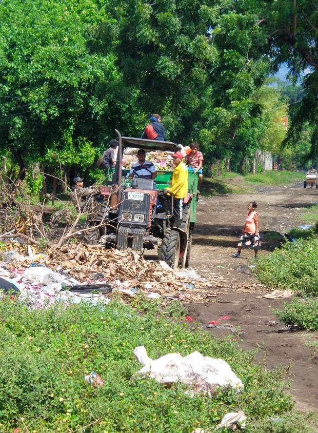 Children on the streets in Nicaragua are vulnerable to all sorts of risks. These children are looking for valuable things to sell and jump on and off rubbish trucks.