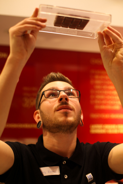 Kay checks the quality of the chocolate