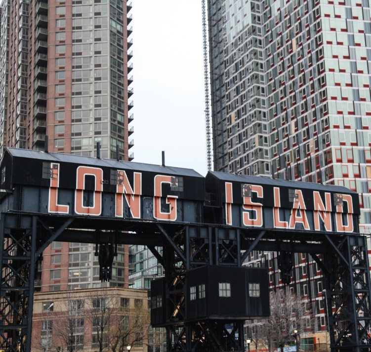 Queens; residential buildings grow out of the industrial landscape.
